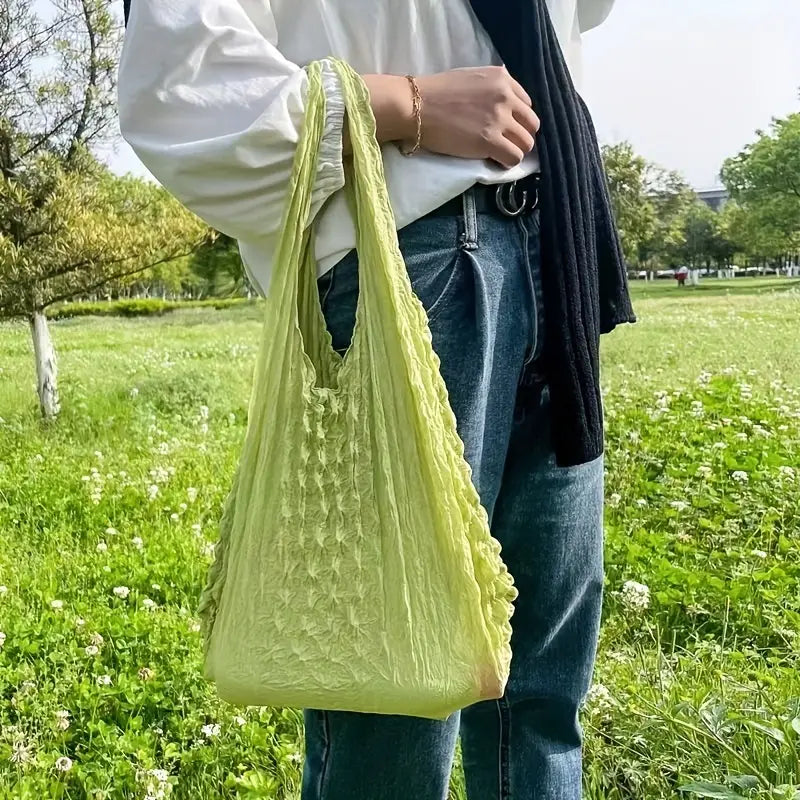BOLSA PLISADA PORTATIL